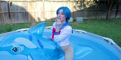 Amy Smokes On Inflatable Dolphin