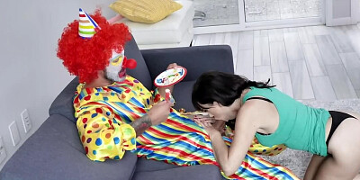 Clothed clown fucks the brunette MILF as an apology for lateness