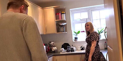 Horny lad sucks busty MILF's tits and fucks her in the kitchen