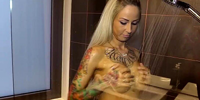 Slim German MILF facialized after sex in the shower