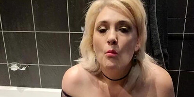 Chubby Mature Blonde Secretly Smoking in the bathroom and ashes on her big tits and pink pussy