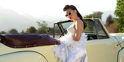 Retro car and Lana Rhoades stripping in the front seat outdoors