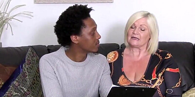 Young black guy has fun with stacked mature blonde